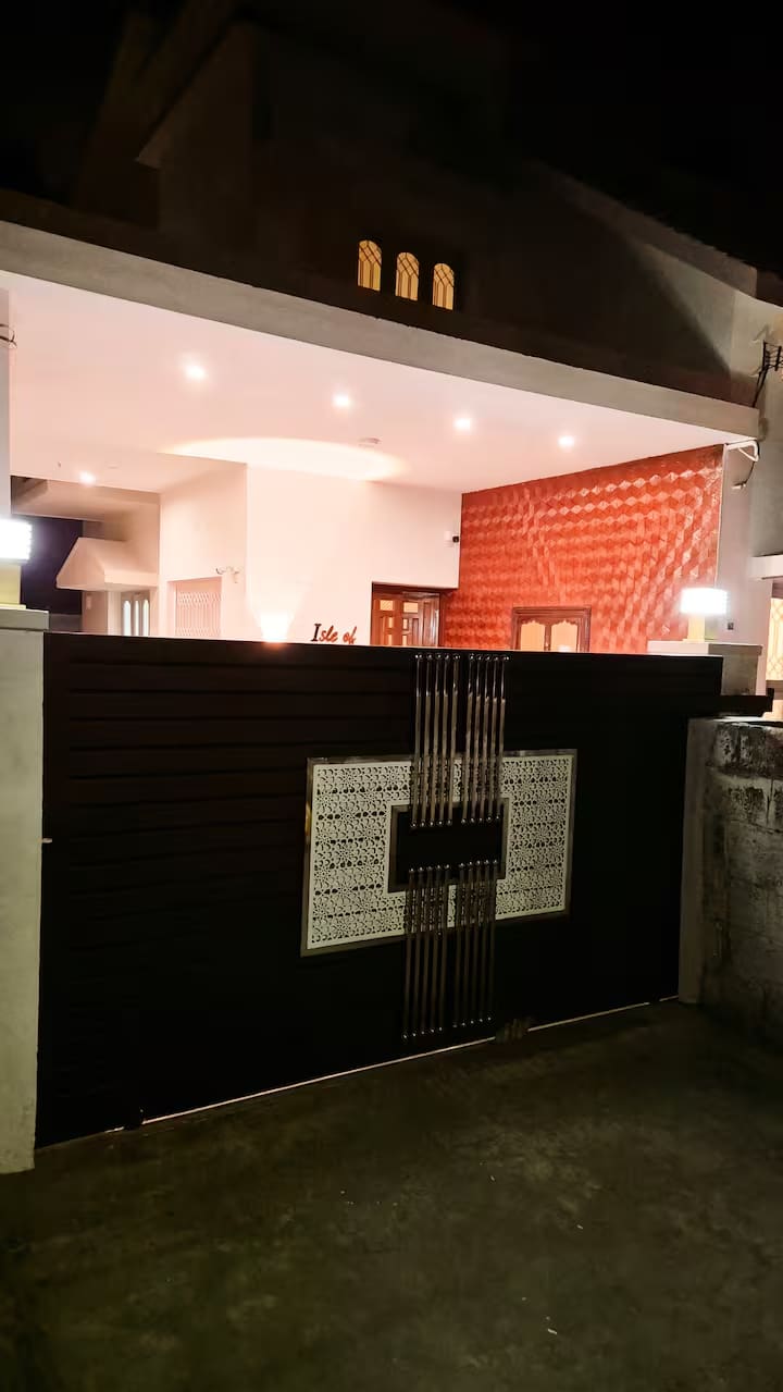 The gate and entrance lit up at night